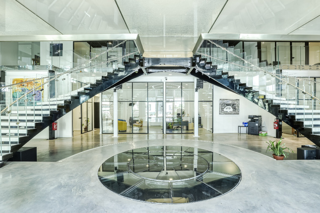 Siège de Manéo - Nouveau sol en béton par Australe Concrete